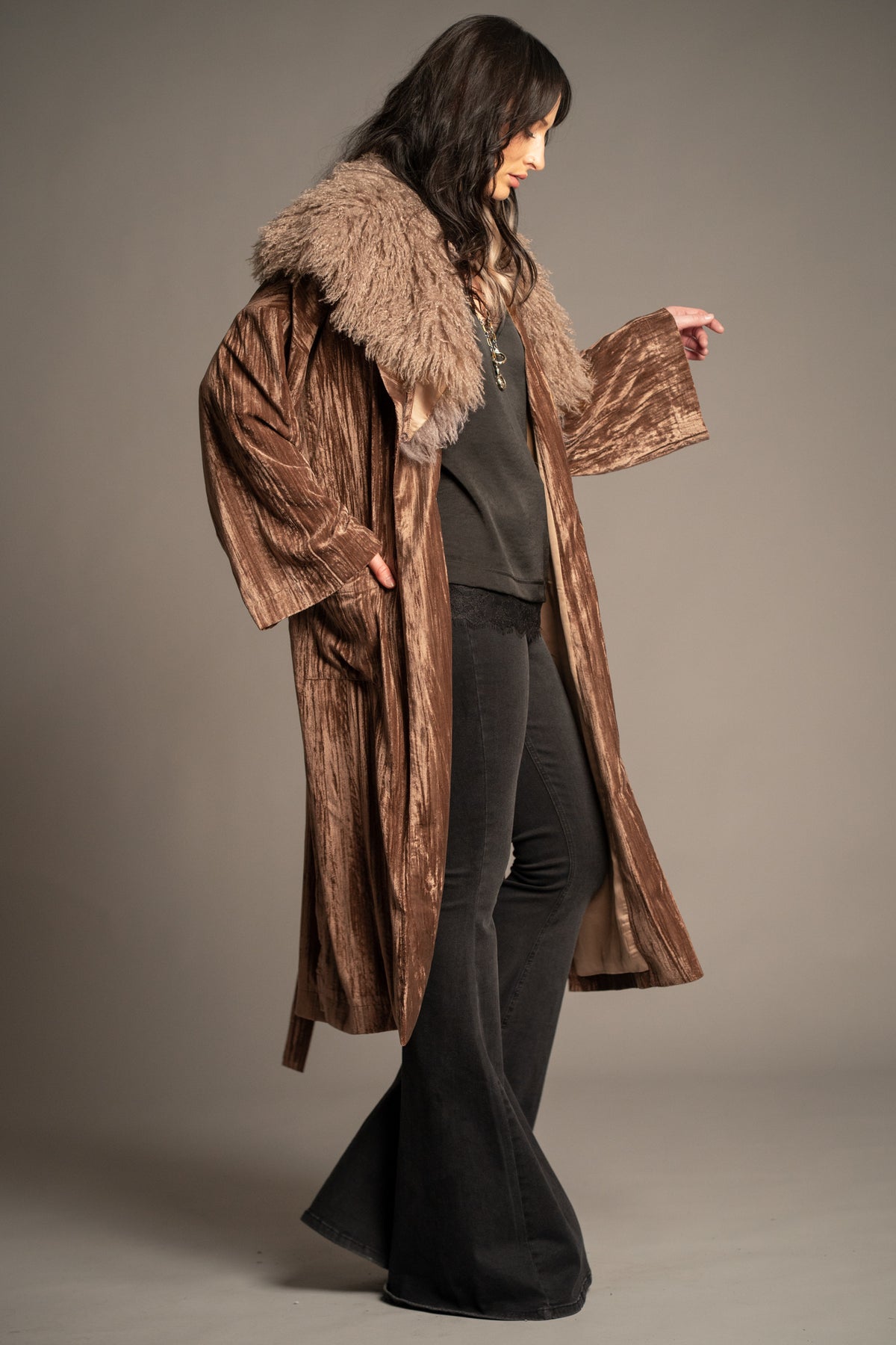 Sienna bronze velvet kimono jacket side view with wide sleeves, faux fur collar and flowing longline silhouette
