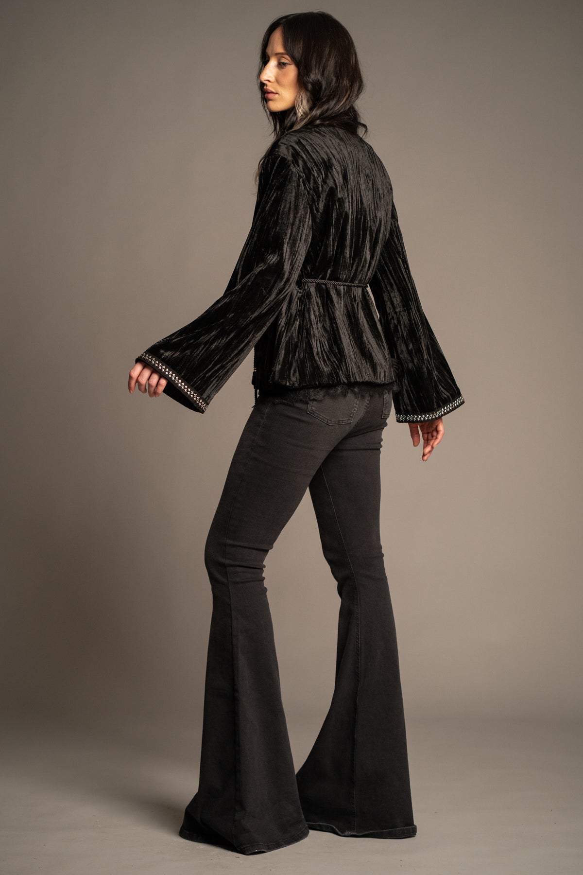 Silver Springs studded velvet jacket back view featuring a tie-back detail, black crushed velvet fabric and relaxed silhouette