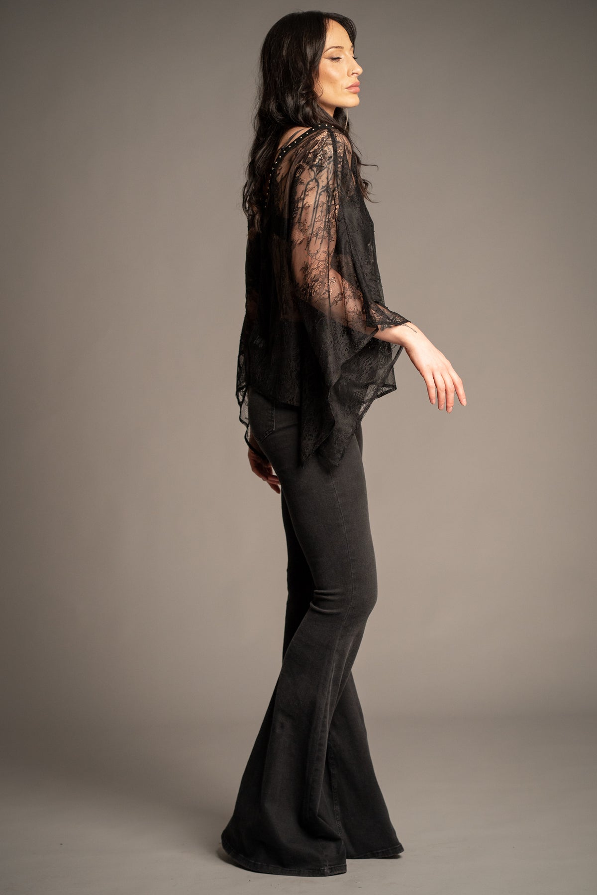 Spellbound studded lace kimono top side view with sheer lace fabric, flowing sleeves and relaxed bohemian silhouette