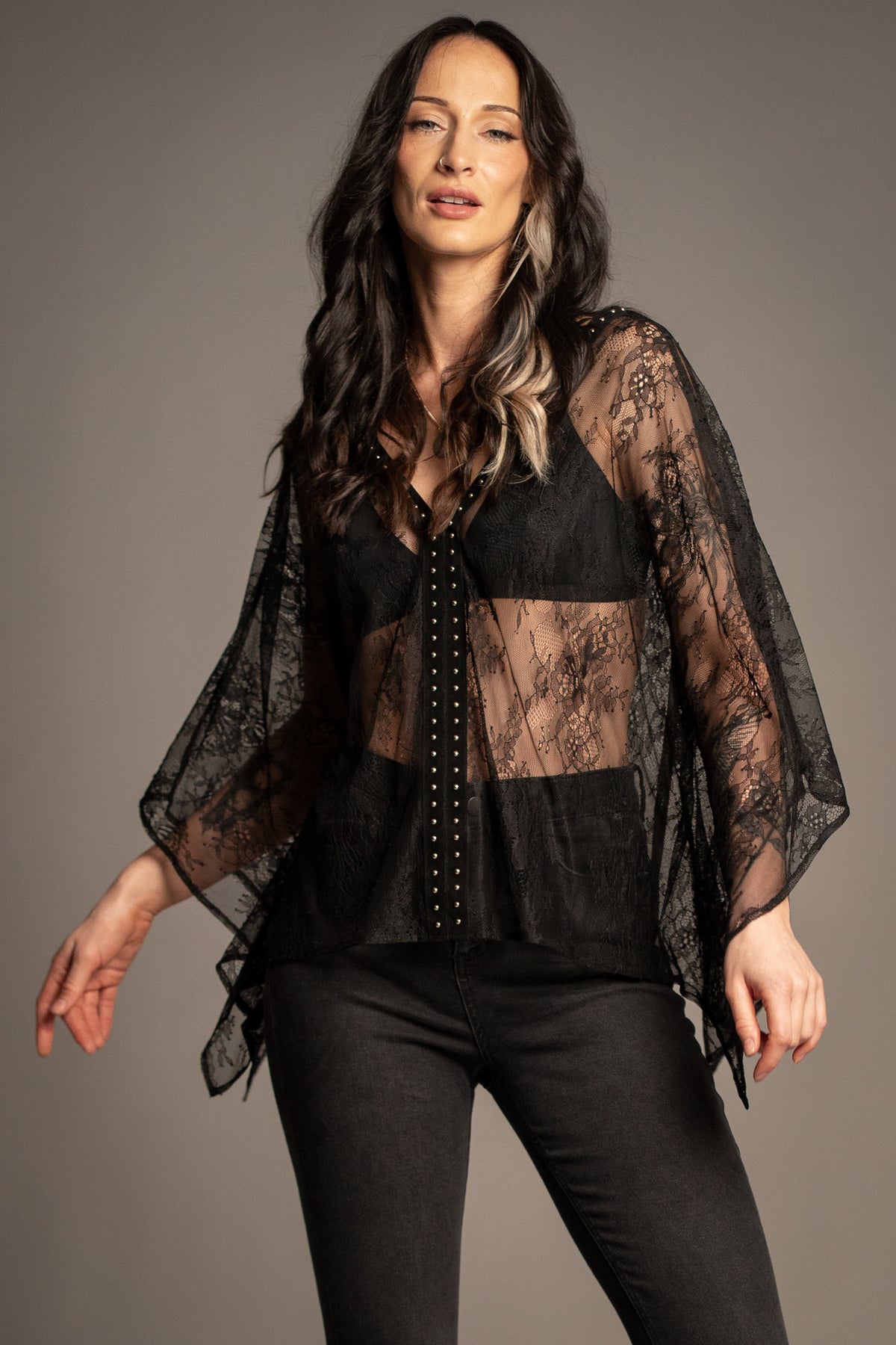 Spellbound studded lace kimono top back view showcasing sheer floral lace, draped silhouette and oversized kimono sleeves