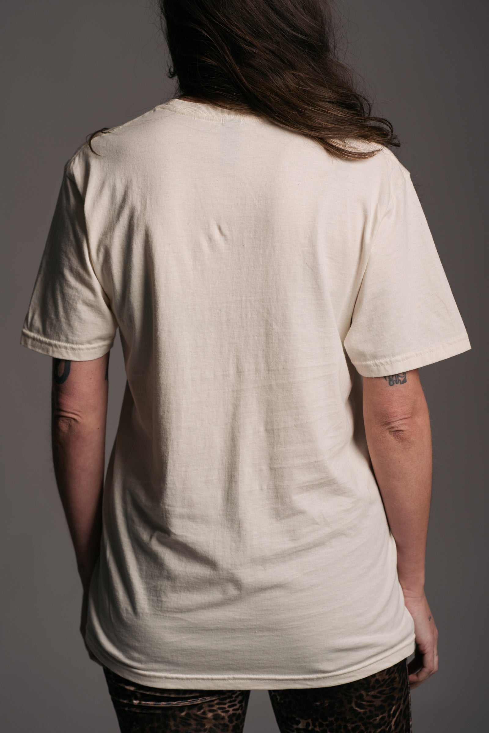 Back view of the Undertones Teenage Kicks Band Tee worn with Hendrix Leopard Velvet Flares on brunette Model