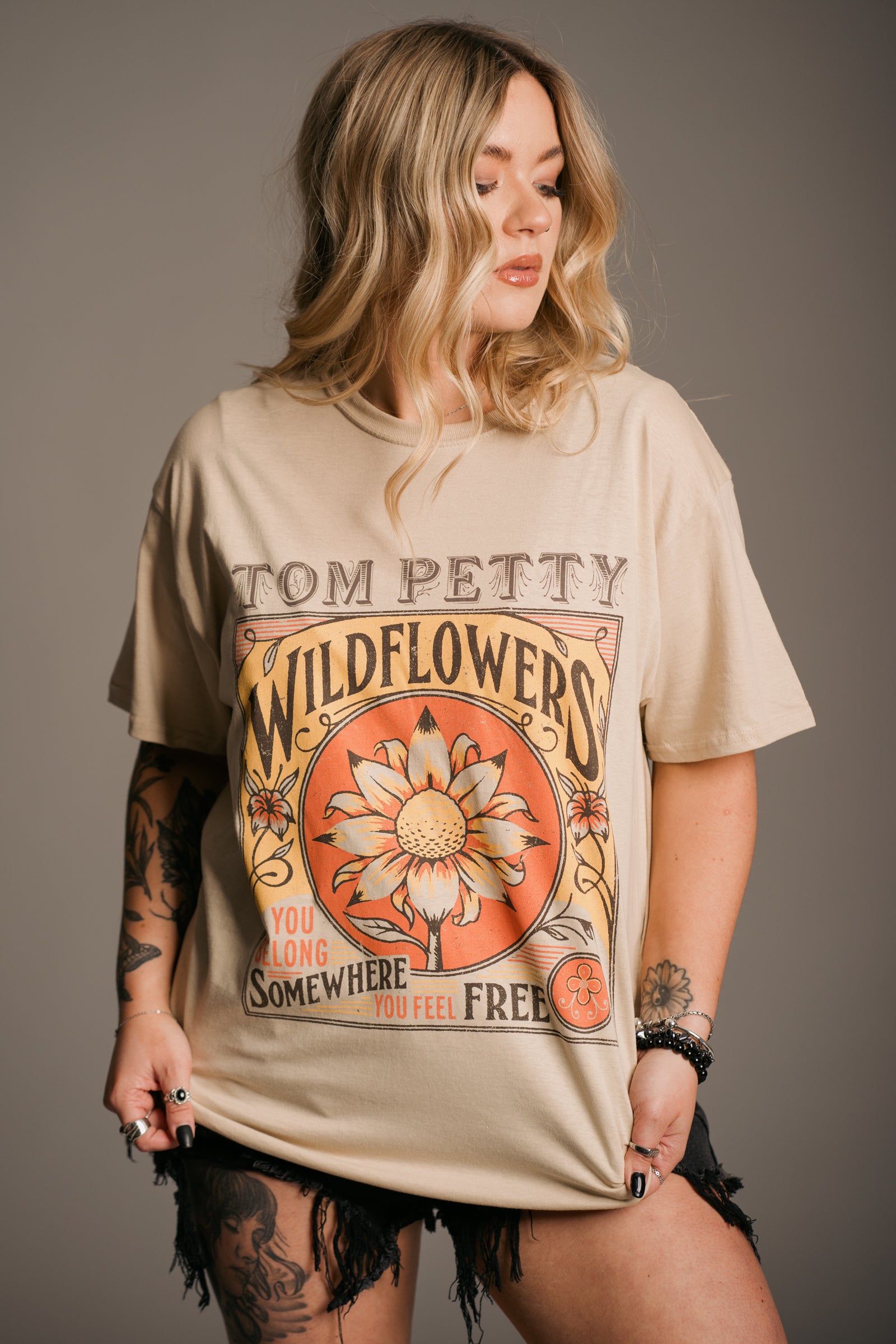 Tom Petty Wildflowers Band Tee featuring licensed album-inspired artwork, a relaxed oversized fit and vintage rock styling