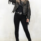 model wearing fringed and studded black colour biker jacket