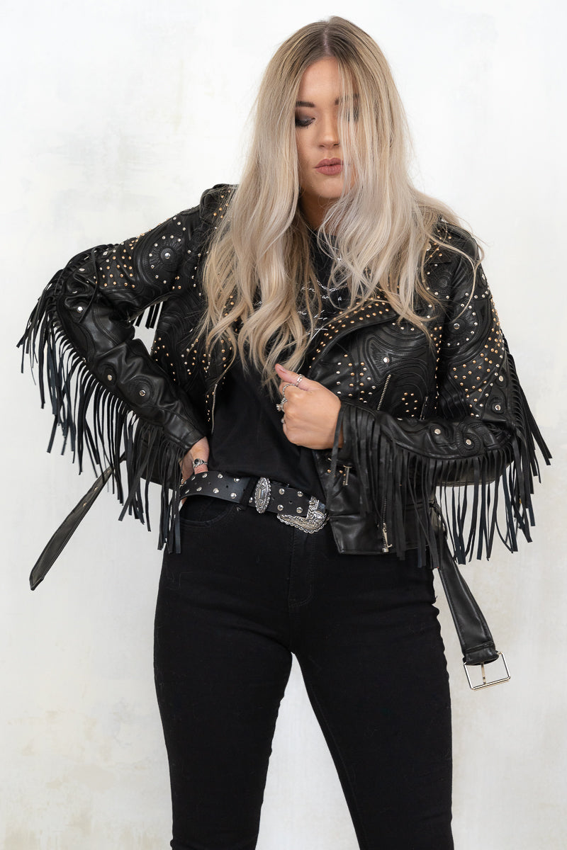 model wearing fringed and studded black colour biker jacket