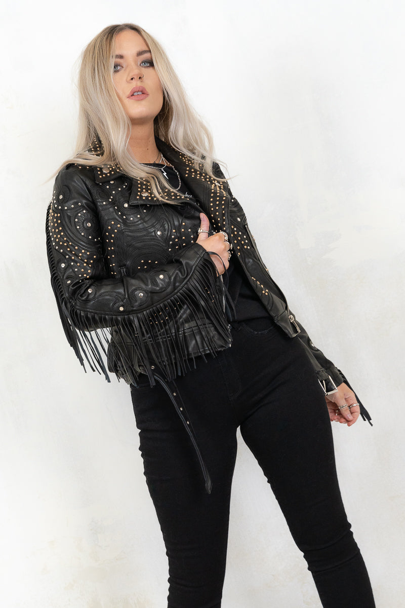 model wearing fringed and studded black colour biker jacket