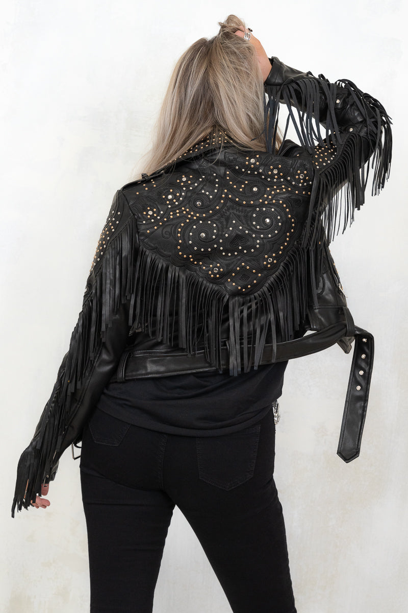 model wearing fringed and studded black colour biker jacket