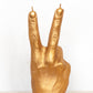 Woodstock Hand Candle - anatomical hand candles in victory hand peace pose in gold, black and silver