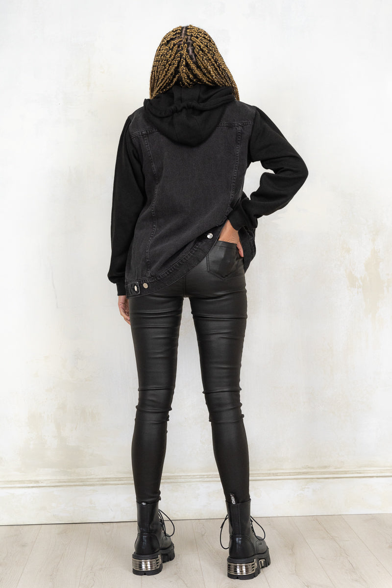Model wearing Hellraiser Denim Jacket - black wash denim jacket with fully buttoned front, true pockets and adjustable drawstring hood