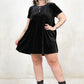 Model wearing Velvet Goldmine Black Smock Dress, a black, velvet, smock dress
