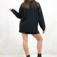Model wearing Bison Monochrome Heavy Knit, a  black relaxed fit jumper with hand drawn bison graphic