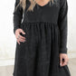 Model wearing Shoot to Thrill Acid Wash Dress, charcoal acid wash jersey smock fit dress with no button or zip closure