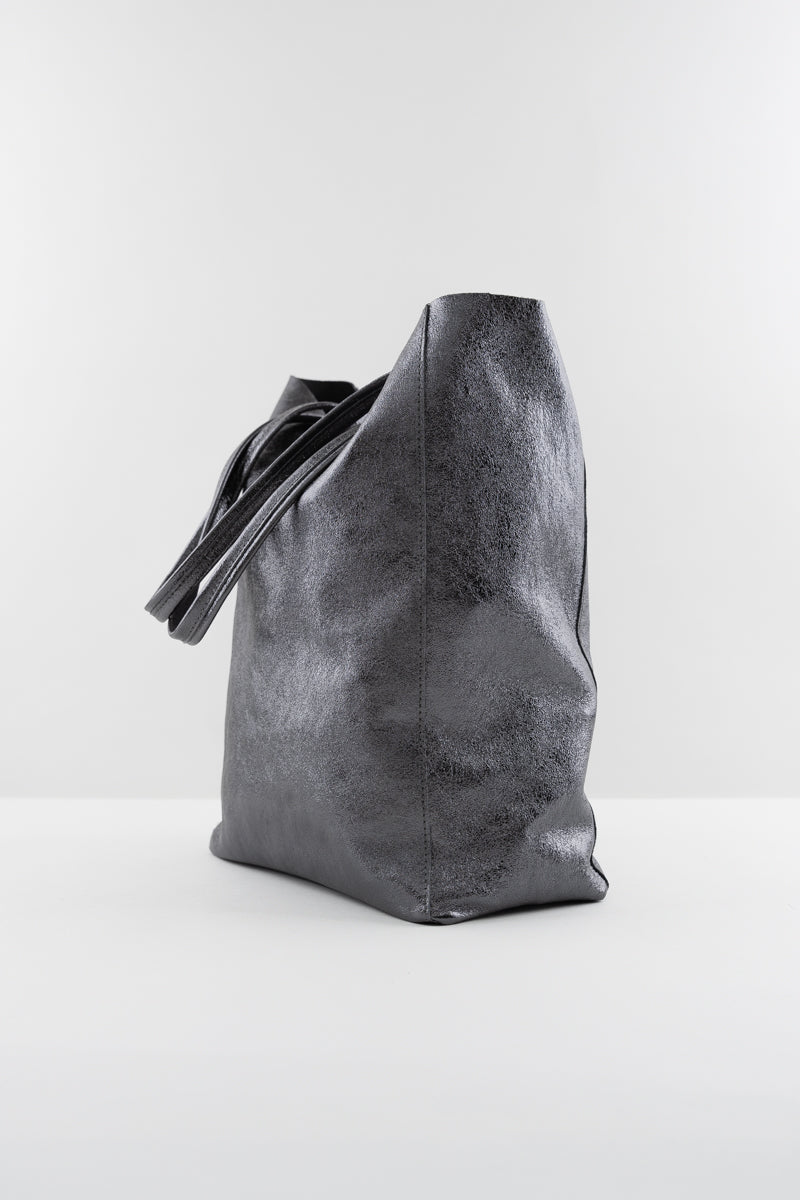 Large gunmetal metallic tote with tie fastening at the top, plus an inner zipped pouch