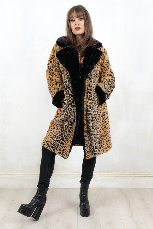 Model wearing Honky Tonk Woman Leopard Coat - leopard print womans coat with Button front, true pockets, quilted lining