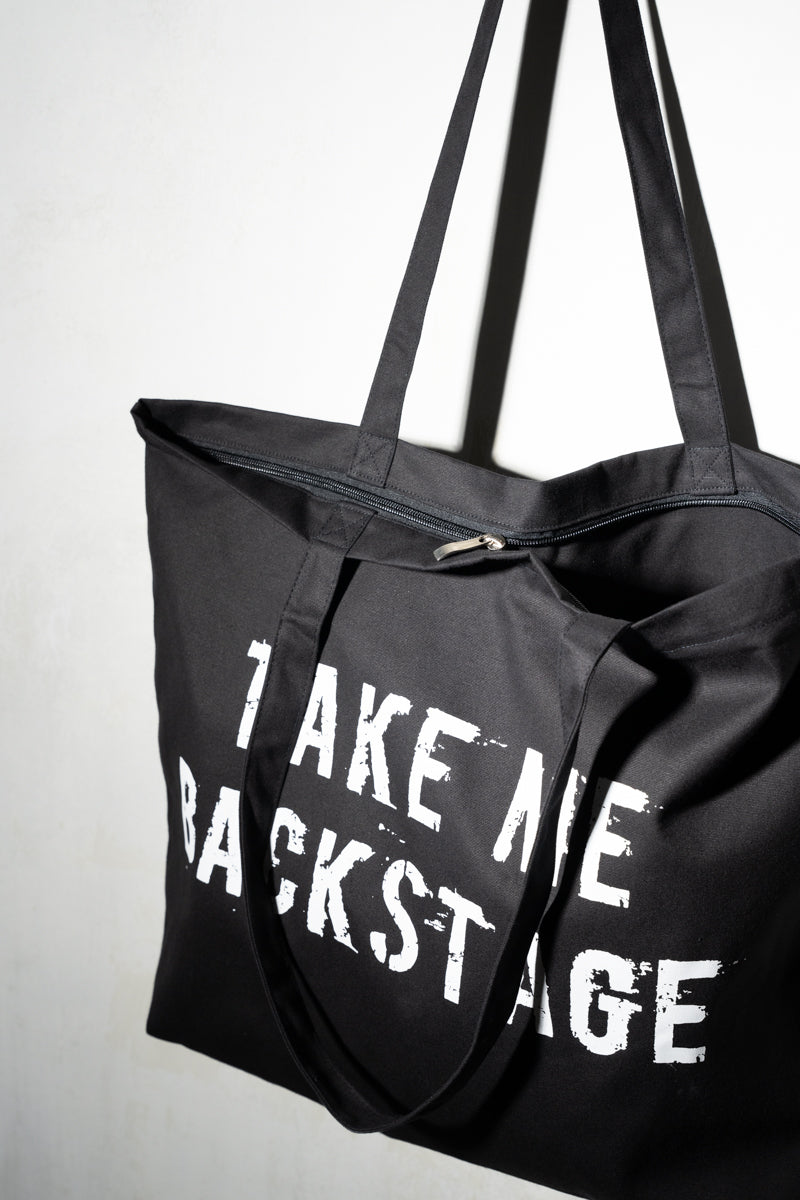 Take Me Backstage Tote Bag, Black oversized tote bag with 'Take Me Backstage' graphic print