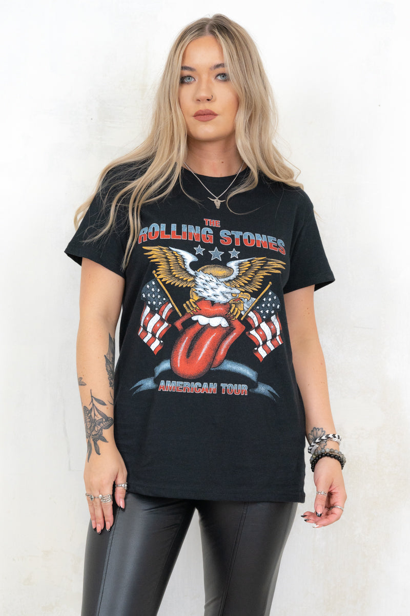 Model wearing Rolling Stones Eagle Tee - The Rolling Stones black, eagle print band tee with American flags