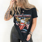 Model wearing Rolling Stones Eagle Tee - The Rolling Stones black, eagle print band tee with American flags 