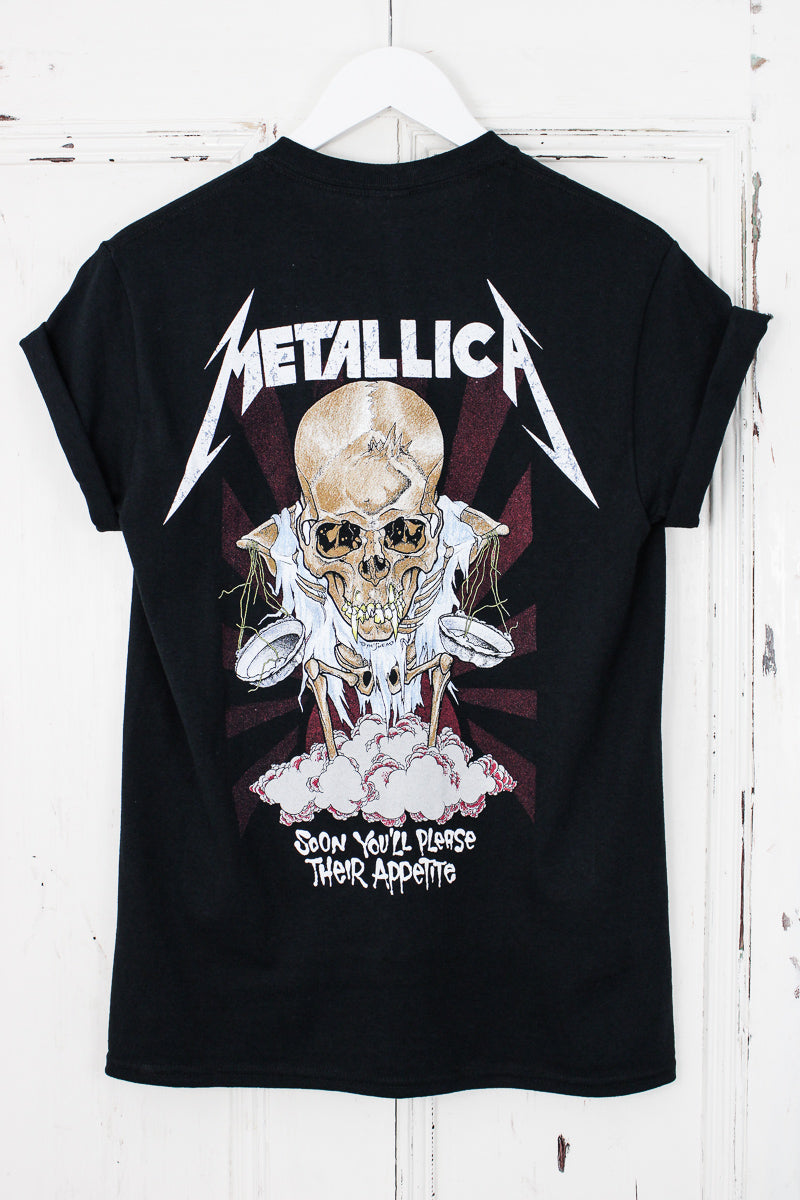 Metallica Doris Tee - Black Metallica Tee with white Metallica logo, skull design and white "Soon You'll Please Their Appetite" slogan on back